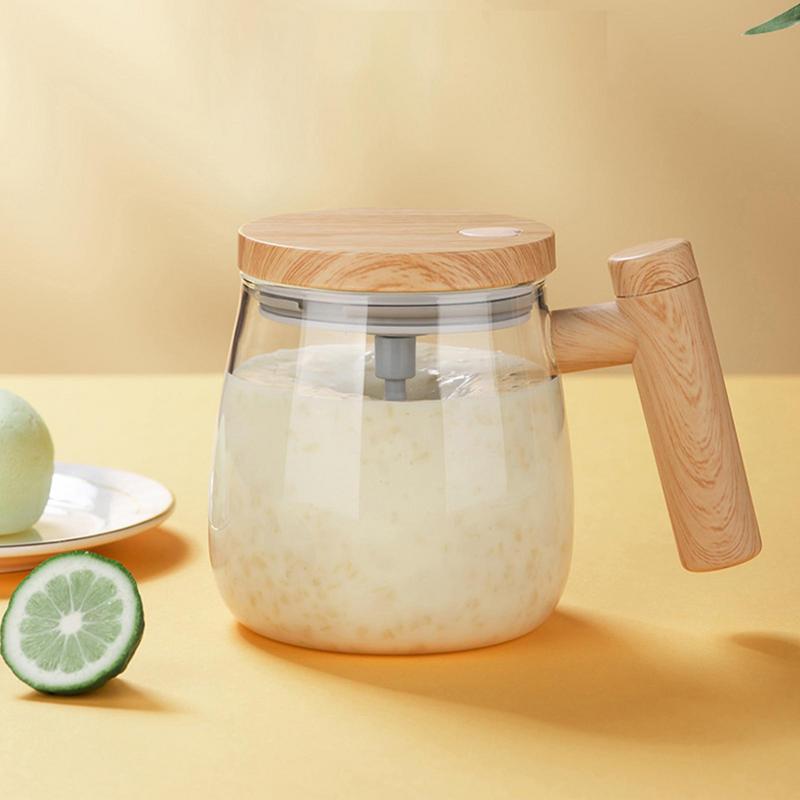 self stirring coffee mug with innovative design and wooden lid, ideal for effortless beverage mixing.