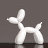 White decorative balloon dog sculpture, adding a playful touch to modern interiors.