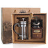 Coffee grinder and French press set displayed in elegant packaging for coffee enthusiasts.