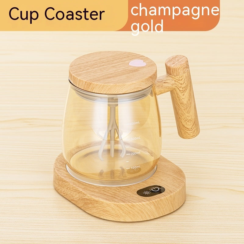 self stirring coffee mug with champagne gold design on a wooden coaster for effortless beverage mixing.
